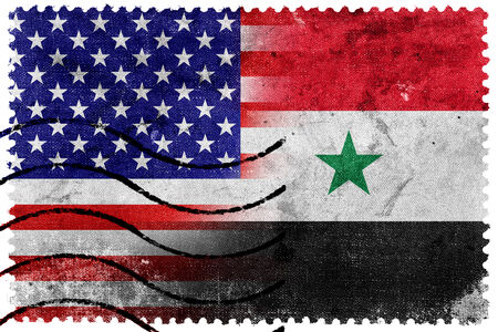 USA and Syria Flag - old postage stampの写真素材