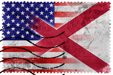 USA and Alabama State Flag - old postage stampの写真素材