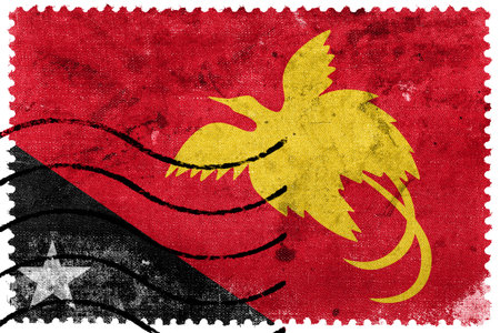 Papua New Guinea Flag - old postage stampの写真素材
