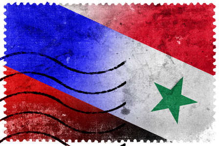 Russia and Syria Flag - old postage stampの写真素材