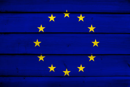 European Union Flag on wood background