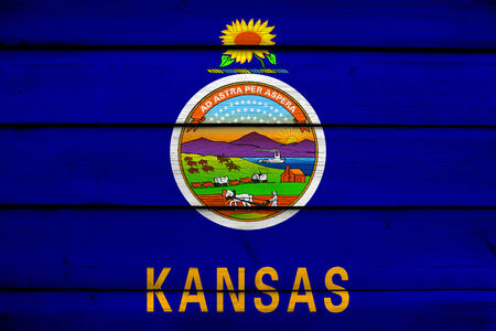 Kansas State Flag on wood backgroundの写真素材
