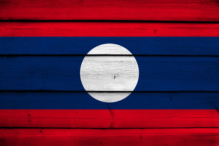 Laos Flag on wood backgroundの写真素材