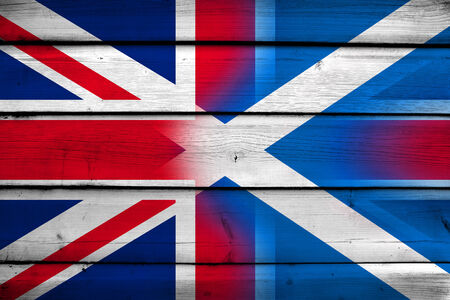 Scotland and United Kingdom Flag on wood backgroundの写真素材