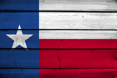 Texas State Flag on wood backgroundの写真素材