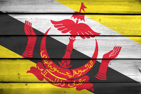 Brunei Flag on wood backgroundの写真素材
