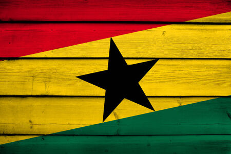 Ghana Flag on wood backgroundの写真素材