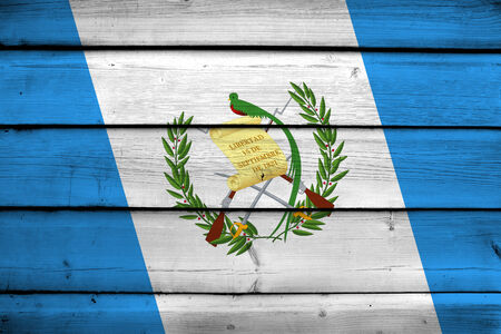 Guatemala Flag on wood backgroundの写真素材