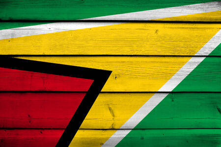 Guyana Flag on wood backgroundの写真素材