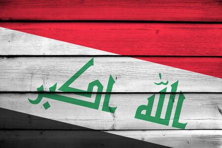 Iraq Flag on wood backgroundの写真素材