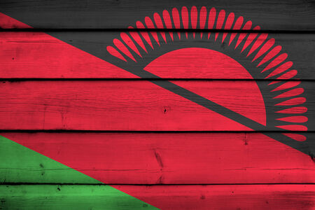 Malawi Flag on wood backgroundの写真素材