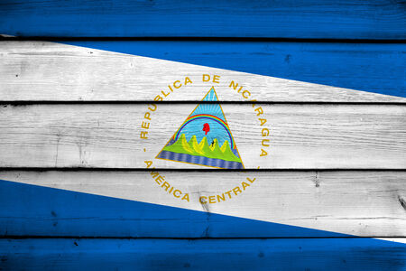Nicaragua Flag on wood backgroundの写真素材
