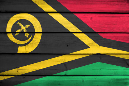 Vanuatu Flag on wood backgroundの写真素材