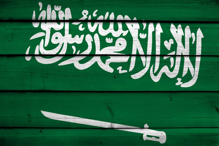 Saudi Arabia Flag on wood backgroundの写真素材