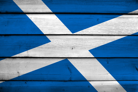 Scotland Flag on wood backgroundの写真素材