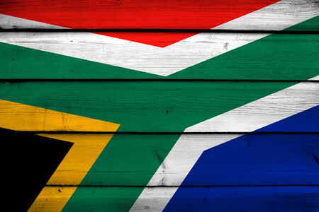 South Africa Flag on wood backgroundの写真素材