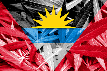 Antigua and Barbuda Flag on cannabis background. Drug policy. Legalization of marijuanaの写真素材