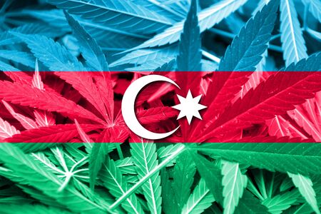 Azerbaijan Flag on cannabis background. Drug policy. Legalization of marijuanaの写真素材