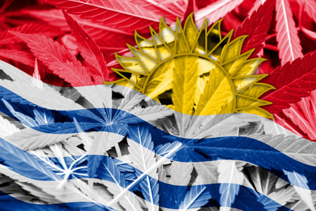 Kiribati Flag on cannabis background. Drug policy. Legalization of marijuanaの写真素材