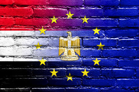 European Union and Egypt Flag painted on brick wallの写真素材