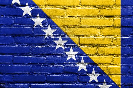 Flag of Bosnia and Herzegovina, painted on brick wallの写真素材