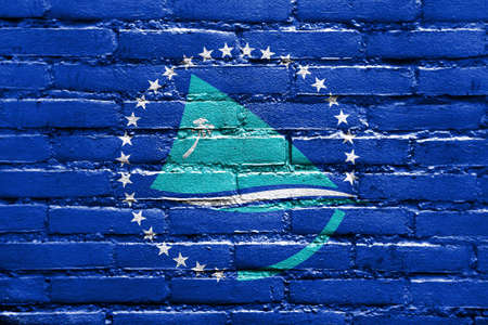 Flag of the Pacific Community, painted on brick wallの写真素材