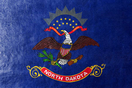 Flag of North Dakota State, painted on leather textureの写真素材