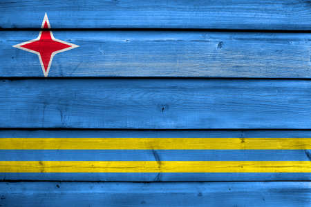 Flag of Aruba, painted on old wood plank backgroundの写真素材