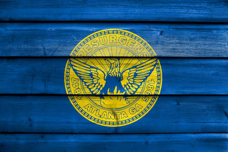Flag of Atlanta, Georgia, painted on old wood plank backgroundの写真素材