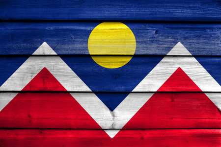 Flag of Denver, Colorado, painted on old wood plank backgroundの写真素材