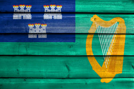 Flag of Dublin, painted on old wood plank backgroundの写真素材