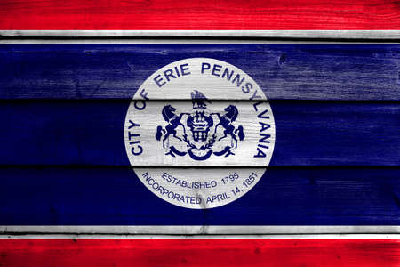 Flag of Erie, Pennsylvania, painted on old wood plank backgroundの写真素材