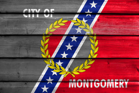 Flag of Montgomery, Alabama, painted on old wood plank backgroundの写真素材