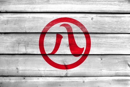 Flag of Nagoya, Japan, painted on old wood plank backgroundの写真素材