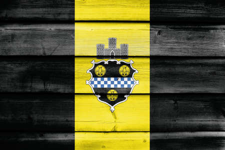 Flag of Pittsburgh, Pennsylvania, painted on old wood plank backgroundの写真素材