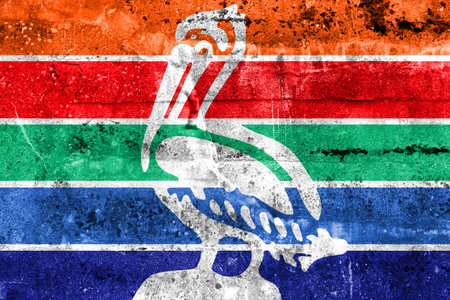 Flag of St. Petersburg, Florida, painted on dirty wall. Vintage and old look.の写真素材