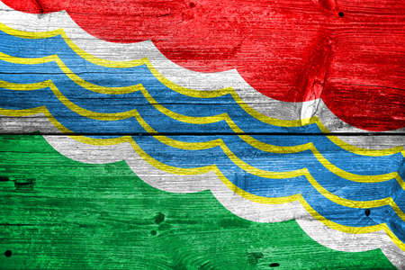 Flag of Tiraspol, painted on old wood plank backgroundの写真素材