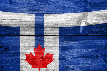 Flag of Toronto, painted on old wood plank backgroundの写真素材