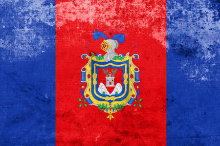 Flag of Quito, Ecuador, with a vintage and old lookの写真素材