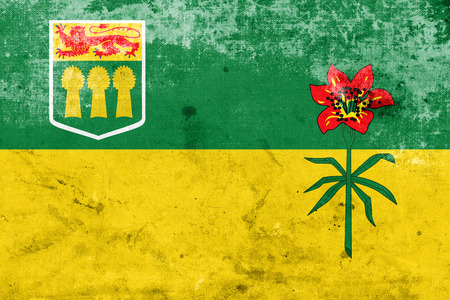 Flag of Saskatchewan Province, Canada, with a vintage and old lookの写真素材