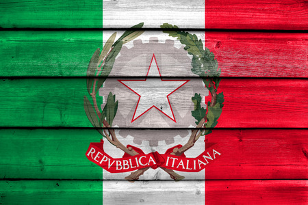 Flag of Italy with National Emblem, painted on old wood plank backgroundの写真素材