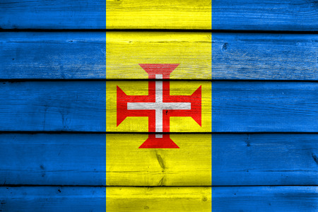 Flag of Madeira, Portugal, painted on old wood plank backgroundの写真素材
