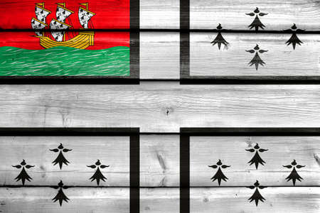 Flag of Nantes, France, painted on old wood plank backgroundの写真素材