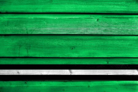 Flag of Osipovichi, Belarus, painted on old wood plank backgroundの写真素材