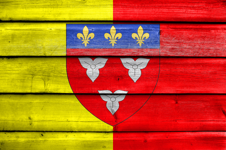 Flag of Orleans with Coat of Arms, France, painted on old wood plank backgroundの写真素材
