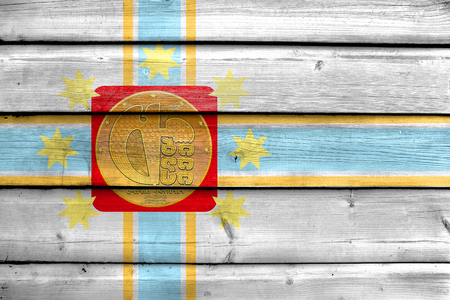 Flag of Tbilisi, Georgia, painted on old wood plank backgroundの写真素材
