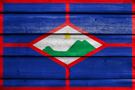Flag of Sint Eustatius, Netherlands, painted on old wood plank backgroundの写真素材