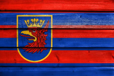 Flag of Szczecin, Poland, painted on old wood plank backgroundの写真素材