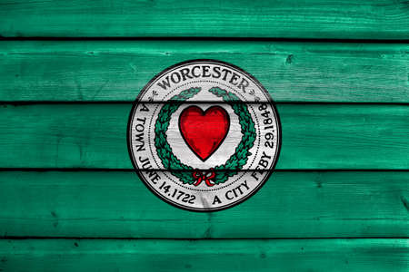 Flag of Worcester, Massachusetts, USA, painted on old wood plank backgroundの写真素材