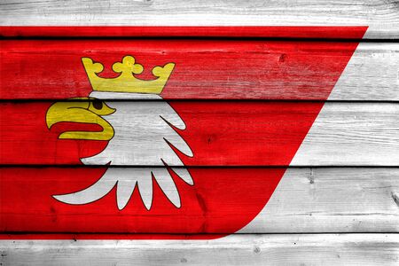 Flag of Warmian-Masurian Voivodeship, Poland, painted on old wood plank backgroundの写真素材